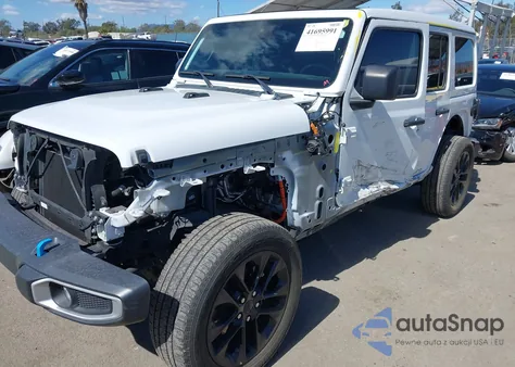 2022 Jeep Wrangler 4Xe Unlimited Sahara 4X4 z USA, uszkodzony, nr VIN 1C4JJXP69NW261068
